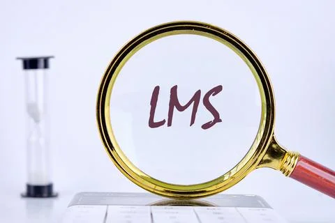 Abbreviation of Learning management system, Word LMS writing through a magnif 스톡 사진