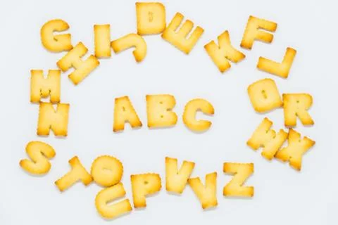ABC cracker in circle of alphabet cracker with white background Stock Photos