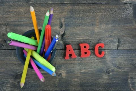 ABC on wooden table Stock-Fotos