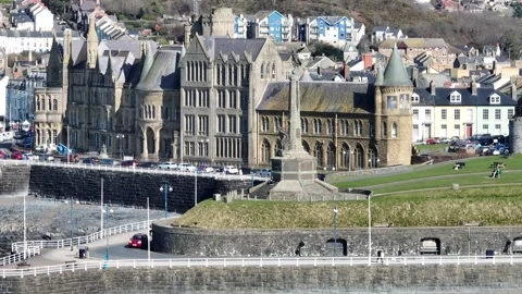 Aberystwyth town Seafront Memorial and Castle Stock Footage 264829019