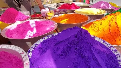 Abirs or different colors and pitchers are being sold  Kolkata during Holi Stock Footage 171961801