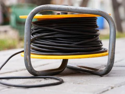 ?able extender wrapped around a yellow reel Stock Photos