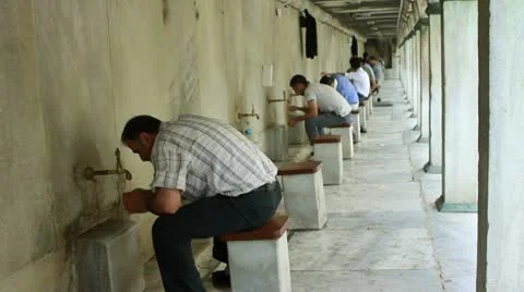 Ablution in a historical mosque Stock Footage 10605877