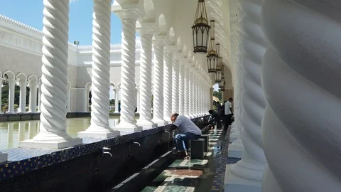 Ablution or wudu at Sultan Omar Ali Saifuddin Mosque Stock Footage 105330194