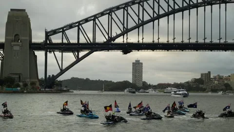 Aboriginal and Australian flags on Jet skis in Sydney harbour 6K Video stock 330383309