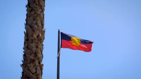 Aboriginal Flag blowing in the wind Stock Footage 124935269