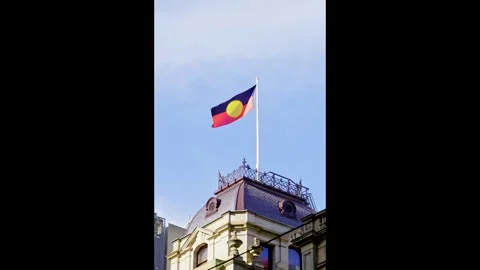 Aboriginal Flag Flying Above Historic Melbourne Building Stock-Footage 324692532