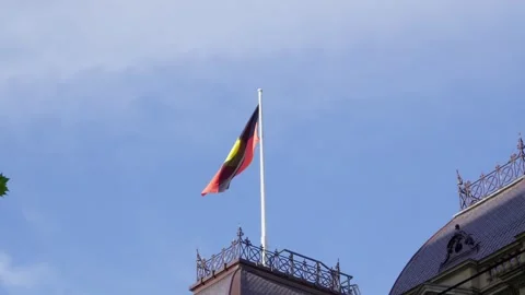Aboriginal Flag Flying Above Historic Melbourne Building Stock-Footage 324692755