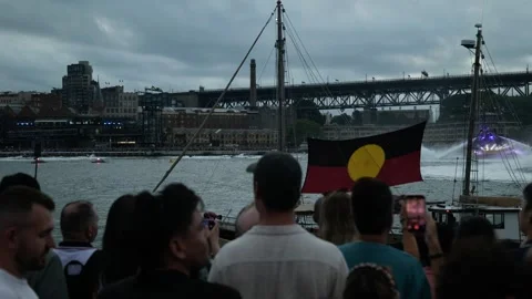 Aboriginal flag passes Sydney crowds Australia Day 6K Stock Footage 330441355
