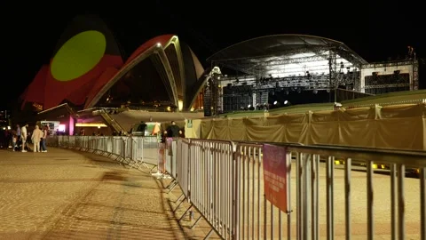 Aboriginal flag on Sydney Opera House next to music stage 6K Stock Footage 330511501