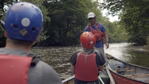 About to begin a canoeing expedition on the river Stock Footage 98251618