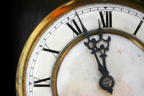About twelve on old clock face Stock Photos