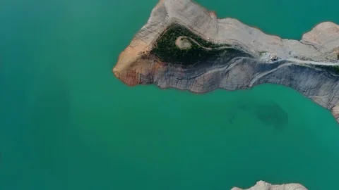 Above aerial view from copter at the small island surrounded by Dim River in Stock Footage 86525740