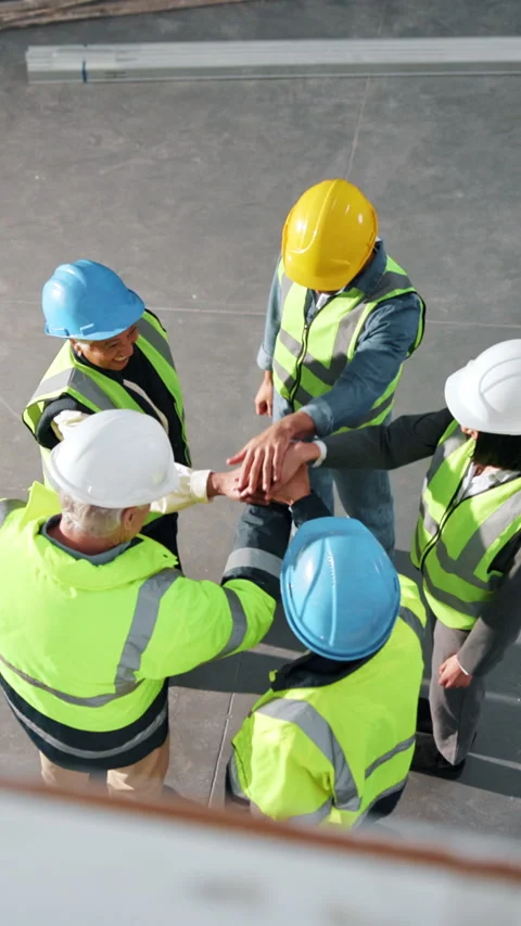 Above, applause and engineer with hands together in warehouse for construction Stock Footage 342324037