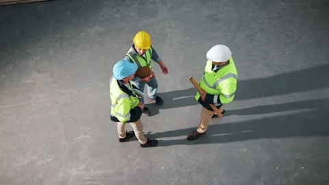 Above, architect and handshake on site with engineer, discussion or meeting for Stock Footage 341565068
