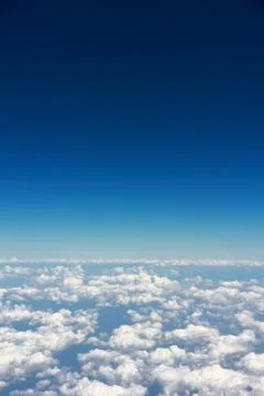 Above cloud blue sky background only Stock Photos