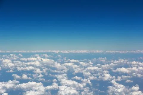 Above cloud blue sky background only Stock Photos