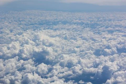 Above cloud blue sky background only Stock Photos