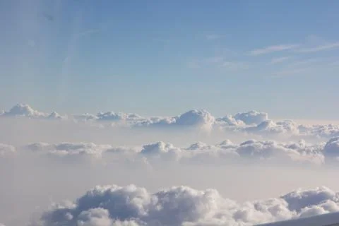 Above cloud blue sky background only Stock Photos