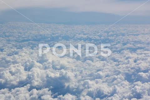 Above cloud blue sky background only Stock Photos