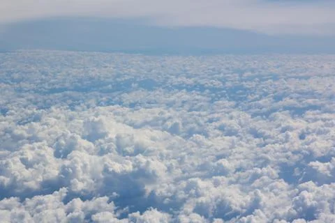 Above cloud blue sky background only Stock Photos
