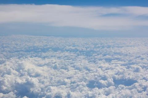 Above cloud blue sky background only Stock Photos