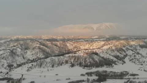 Above cloud layer to sunrise mountains Video stock 166498482