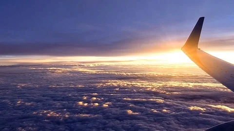 Above the cloud sunset view from aeroplane window Stock Footage 91650232