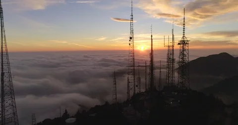 Above the clouds and antenna on Mt. Wilson, Los Angeles, California Stock Footage 86107450