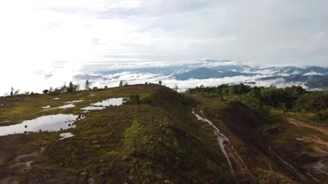 Above clouds and valleys Stock Footage 253557566