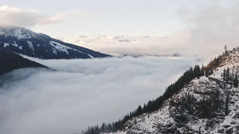 Above the clouds in Austria Stock Footage 148042377