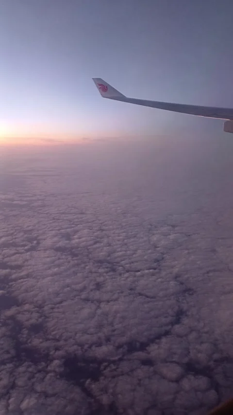 Above the clouds blanket- window view 4k Stock Footage 286106892