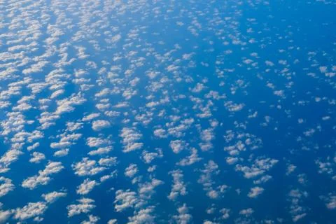 Above  clouds - clouds over ocean aerial Stock Photos