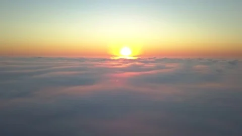 Above the clouds drone aerial sunset Stock Footage 77883021