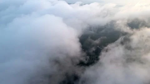 Above the clouds with drone Stock Footage 331348674