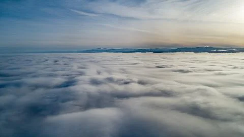 Above the clouds during a sunset Stock Photos