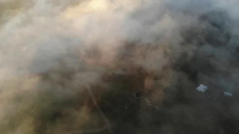 Above the clouds, flying in the air. View of clouds through airplane window. Stock Footage 117469999