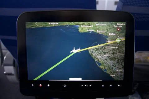 Above the clouds, May 10 2018: Inflight entertainment screen showing flight Stock Photos