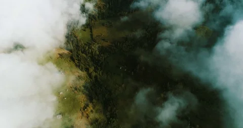 Above the clouds in the mountains Stock Footage 128699799