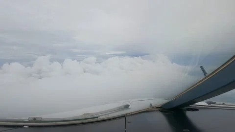Above the clouds in a plane Stock Footage 229366501