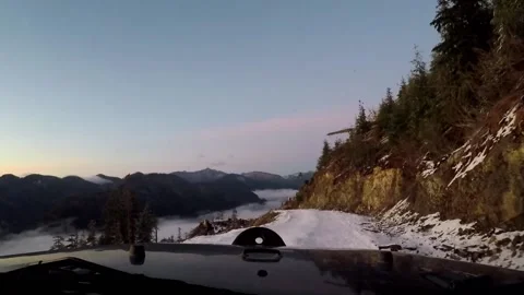 Above the clouds on snow covered logging trail Stock Footage 172564911