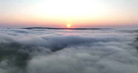 Above the clouds at sunrise Stock Footage 248849309