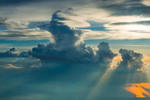 Above the clouds on sunset Stock Photos