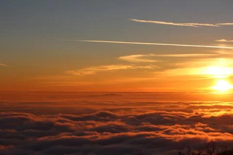Above the clouds Sunset Stock Photos