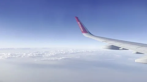 ABOVE THE CLOUDS, UAE - APRIL 15, 2026: An aerial view from an Air Arabia f.. Stock Footage 332792138