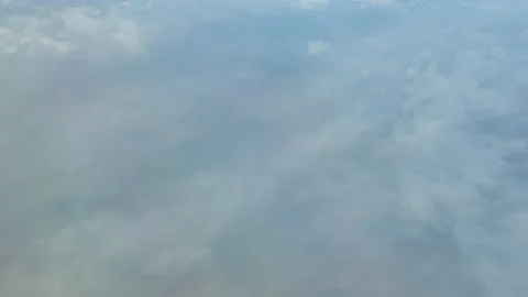 Above the clouds view from the airplane - 4K, Sky background Stock Footage 174152508