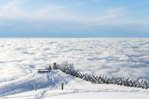 Above the clouds. View from the mountain of Riga, Switzerland. Meditation bench Stock-Fotos