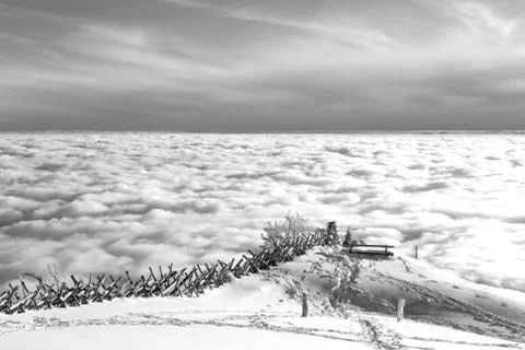 Above the clouds. View from the mountain of Riga, Switzerland. Meditation bench Stock Photos