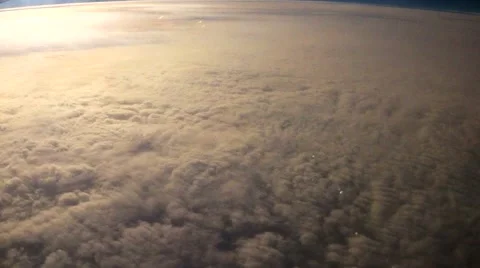 Above the clouds view in time lapse from airplane view Stock Footage 45581975