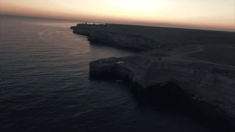 Above the coast in the sunset Video stock 90028648